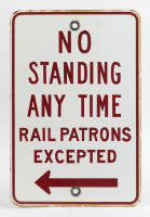 PARKING SIGN: An Australian metal 'No Standing Any Time - Rail Patrons Excepted' sign, 45cm high, 30cm wide