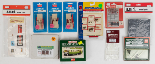 DIORAMA PARTS: A bag of assorted diorama parts