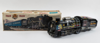 TIN TOY TRAIN: A large friction powered tin toy 'Tiger Train' locomotive, 45cm long, in original box