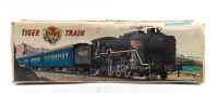 TIN TOY TRAIN: A large friction powered tin toy 'Tiger Train' locomotive, 45cm long, in original box - 2
