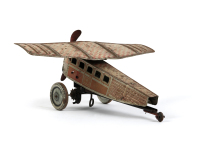 TINPLATE MODEL: A circa 1920s or 1930s German made clockwork tinplate aeroplane model, believed to be SG brand, 23cm long, wingspan 26cm - 2