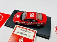 HOLDEN MONARO: A 1:43 scale Autoart model of the Holden Monaro CV8 driven by Peter Brock in the 2002 Targa Tasmania, limited edition 0455/5000, complete with original packaging and certificate of authenticity, together with a group of Holden stickers [Loc - 3