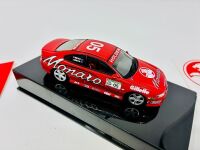 HOLDEN MONARO: A 1:43 scale Autoart model of the Holden Monaro CV8 driven by Peter Brock in the 2002 Targa Tasmania, limited edition 0455/5000, complete with original packaging and certificate of authenticity, together with a group of Holden stickers [Loc - 4