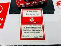 HOLDEN MONARO: A 1:43 scale Autoart model of the Holden Monaro CV8 driven by Peter Brock in the 2002 Targa Tasmania, limited edition 0455/5000, complete with original packaging and certificate of authenticity, together with a group of Holden stickers [Loc - 5