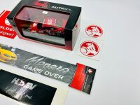 HOLDEN MONARO: A 1:43 scale Autoart model of the Holden Monaro CV8 driven by Peter Brock in the 2002 Targa Tasmania, limited edition 0455/5000, complete with original packaging and certificate of authenticity, together with a group of Holden stickers [Loc - 6