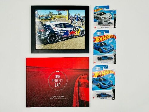 126 · MAD MIKE WHIDDETT: A hardcover book, 'One Perfect Lap: The Wild History of the World Time Attack Challenge, together with 3 Hot Wheels models including one signed by Mad Mike and a framed photo of Mad Mike's Mazda 3 [Location: Sydney]