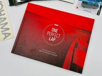WORLD TIME ATTACK: A hardcover book, 'One Perfect Lap: The Wild History of the World Time Attack Challenge, together with a group of event programmes, a Yokohama sticker and a Hot Wheels model [Location: Sydney] - 2