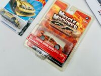 NISSAN: Three Hot Wheels 1:64 scale Nissan models together with a Muscle Machines 1:64 scale model and a group of Nismo flyers [Location: Sydney] - 2