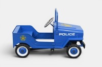 PEDAL CAR: A modern metal-bodied pedal car in the form of a Jeep in Police livery, measures approx. 88cm long