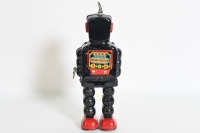 WALKING ROBOT: A c1950s Yoshiya KO Toys (Japan) tin toy wind-up walking robot with visible gears, 23cm high - 2