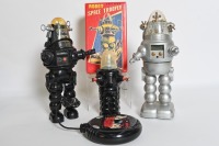 TOY ROBOTS: Three toy robots, includes two Robby the Robots, both 26cm high