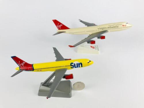 VIRGIN: Two models (longest 28cm): A 1:200 scale Virgin Atlantic 747 plastic model, registration 'G-VFAB' and A 1:200 scale Virgin Sun Airbus A320 'Mediterranean Maiden' plastic model, registration 'S-VMED'.