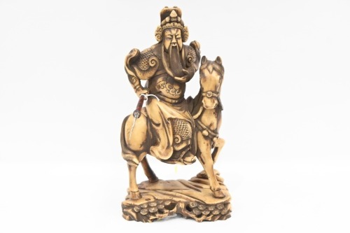 WARRIOR: A large resin figure of a Chinese warrior on horseback, 33cm high