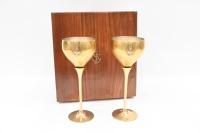 GOBLETS: Two decorative solid metal stemmed wine goblets in fitted timber box, both with anchor motif, glasses 22.5cm high