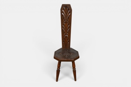 SPINNING CHAIR: An antique timber, carved spinning chair, measures 101cm high. Thought to be oak.