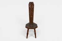 SPINNING CHAIR: An antique timber, carved spinning chair, measures 101cm high. Thought to be oak.