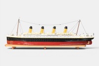 RMS TITANIC: A large lego model of the RMS Titanic, completed, 133cm long, resting on timber base - 2
