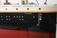 RMS TITANIC: A large lego model of the RMS Titanic, completed, 133cm long, resting on timber base - 3