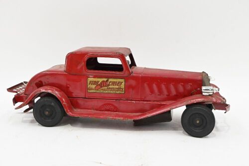 GIRARD MODEL WORKS: A circa 1930s pressed steel clockwork model 'Fire Chief Siren Coupe' by Girard Model Works, 37cm long