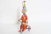 TIN TOY FIGURINES: A group of four tin toy figurines - 3