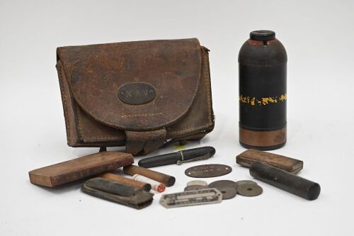 WWII: A collection of Japanese WWII personal items in a leather pouch, with unknown Japanese Military Item
