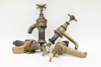 BRASS TAPS: A group of four c1950s John Danks & Sons (Melbourne, Australia) brass tap fittings, all approx. 25cm long