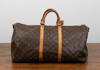 LOUIS VUITTON: A Louis Vuitton Keepall 55 Bandouli&egrave;re Monogram Canvas duffle bag, 55cm wide at base