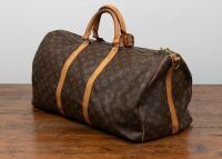 LOUIS VUITTON: A Louis Vuitton Keepall 55 Bandouli&egrave;re Monogram Canvas duffle bag, 55cm wide at base - 2