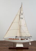 AUSTRALIA II: A model of the yacht Australian II winner of the 1983 America's Cup for the Royal Perth Yacht Club, 92cm high, 61cm wide