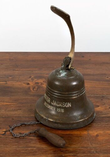85 · BELL: A brass ships bell, stamped 'Mister Jackson - December 1976', bell diameter 22cm, height 22cm