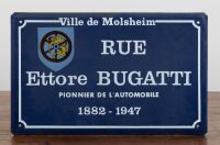 BUGATTI: A circa 1970s reproduced enamel sign 'RUE Ettore BUGATTI - Pionnier de L'automobile - 1882-1947'