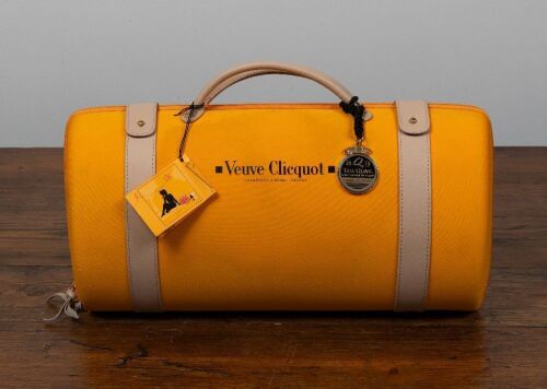 VEUVE CLICQUOT: A Veuve Clicquot Ponsardin gift set, includes a 750ml display bottle with two champagne glasses in travel style branded bag