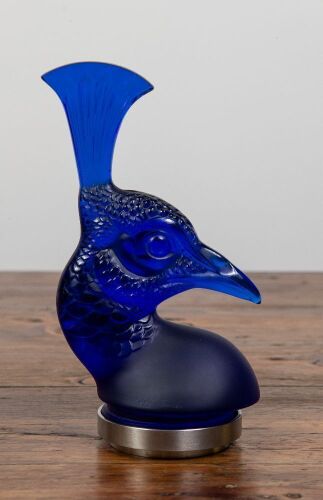 74 · LALIQUE: A modern Lalique blue peacock glass paperweight, etched 'Lalique France' to side of base, with turned metal base, 17.5cm high