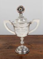MOTORCYCLE: A large early twin handled silver plate trophy cup, presented by the Western Suburbs Motor Cycle Club, being The George Nichols' Cup, 44cm high