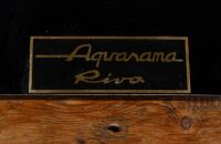 RIVA AQUARAMA: A large Riva Aquarama model speedboat on ebonised timber base, 43cm high (on base), approx. 160cm long - 3