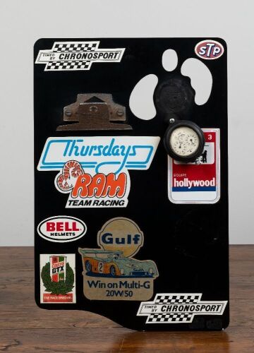 63 · CHRONOSPORT: A circa 1970s timing clip board with affixed American racing stickers and Junghans (Germany) 1/10 Second Stopwatch