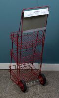 REDEX: A circa 2000s three tier RedeX battery display stand on wheels with metal sign - 2