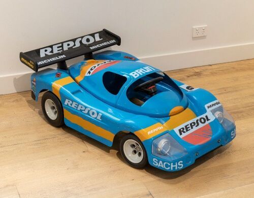 31 · PORSCHE: A large circa 1980s plastic Porsche 956 / 962 pedal car in race livery, 115cm long