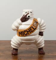 BIBENDUM: An aluminum Bibendum figure as used on early 20th Century forecourt compressor trollies, 34cm high