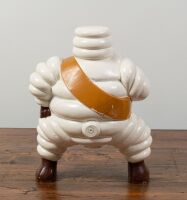 BIBENDUM: An aluminum Bibendum figure as used on early 20th Century forecourt compressor trollies, 34cm high - 2