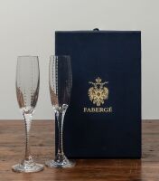 FABERGE: A boxed pair of Faberge champagne flutes, Atelier Crystal Collection, in original tissue wrapping