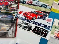 SUPER TOURING: A hardcover book, 'Touring Cars' by John Tipler together with a 3 signed photos by Peter Brock, Geoff Brabham and Jim Richards and a group of race programmes, stickers and posters [Location: Sydney]. - 11