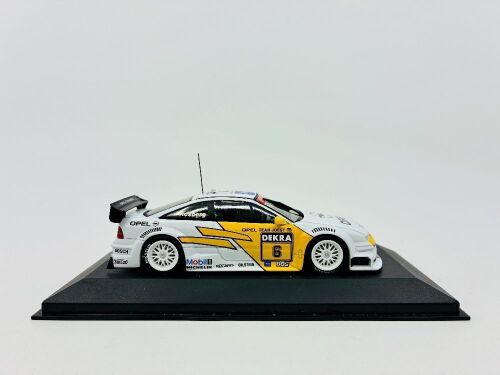 DTM: A 1:43 scale model by Minichamps of the Opel Calibra V6 DTM [Location: Sydney]