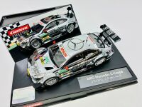 DTM: A 1:32 scale slot car by Carrera of the Mercedes-Benz AMG C-Coupe driven in the 2012 DTM season, complete with original packaging [Location: Sydney] - 2