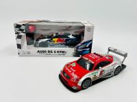 DTM: Two Audi DTM 1:24 scale RC models including an Audi RS5 DTM by CMJ, complete with original packaging and an Audi TT-R DTM [Location: Sydney]