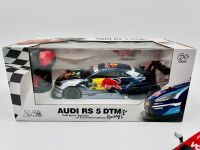 DTM: Two Audi DTM 1:24 scale RC models including an Audi RS5 DTM by CMJ, complete with original packaging and an Audi TT-R DTM [Location: Sydney] - 2