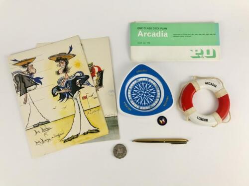 P&O ARCADIA: Seven items: One 'One Class Deck Plan' July 1972, one Arcadia plastic ashtray, one Arcadia metal pen, one Arcadia small model plastic and string life buoy, one Arcadia enamel and brass pin front, and two Arcadia menu's, March 6 and 9, 1977,