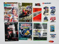 MOTORCYCLE RACING: A group of event programmes together with a copy of Classic Racer Magazine, stickers and a 1:43 scale Ducati 996 model [Location: Sydney]