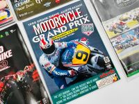 MOTORCYCLE RACING: A group of event programmes together with a copy of Classic Racer Magazine, stickers and a 1:43 scale Ducati 996 model [Location: Sydney] - 3
