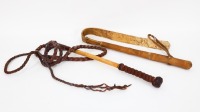 WHIPS: Two whips, one believed to be a riding whip, whilst the other is a stock whip